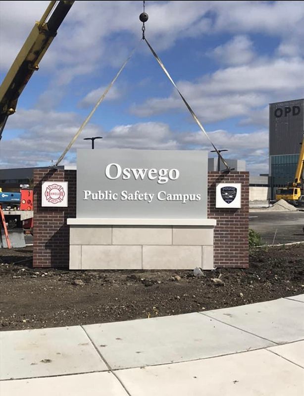 Decorated Brick Monument Oswego Public Saftey Campus Exterior Signage