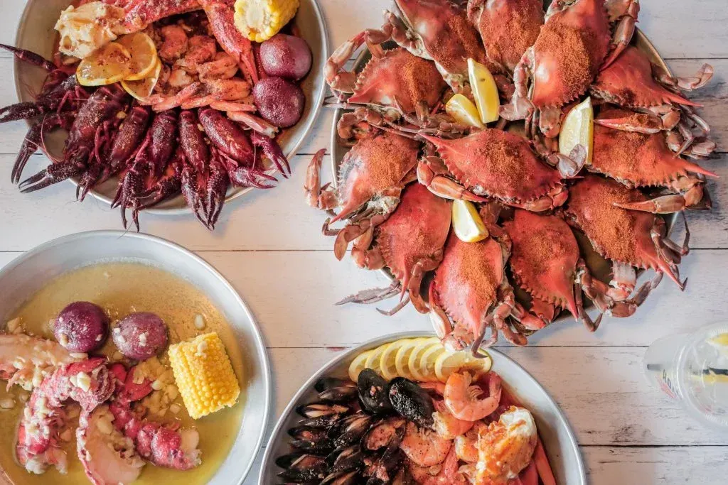 There are many different types of seafood on the table.