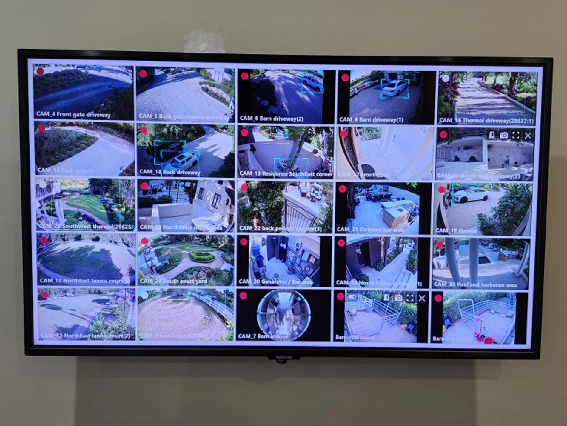 A large flat screen tv with a lot of pictures on it