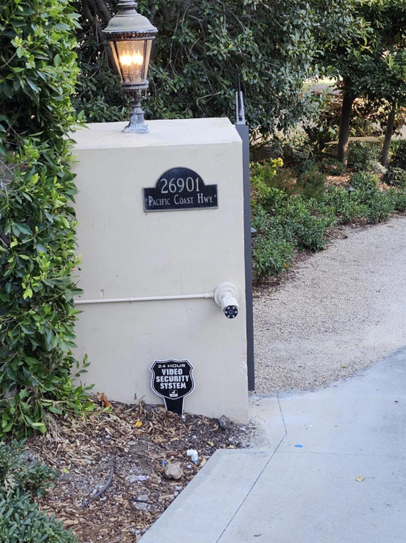 A sign on a wall that says 26901 on it