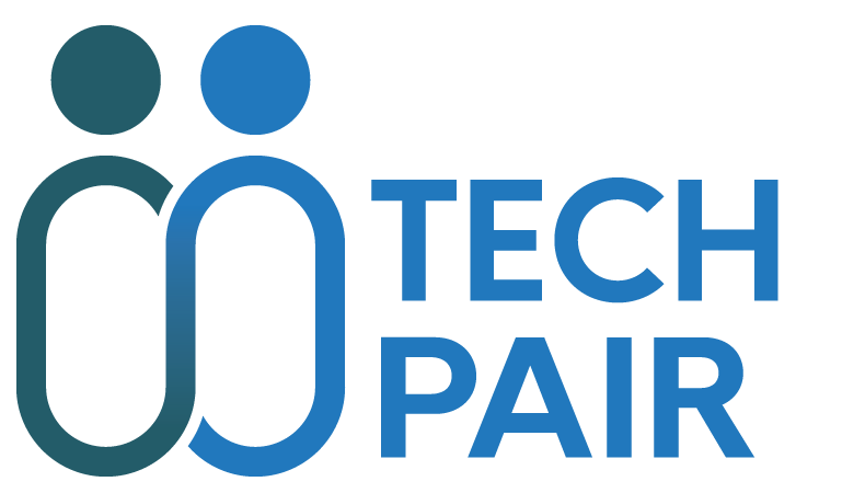 A blue and green logo with two people standing next to each other on a white background.