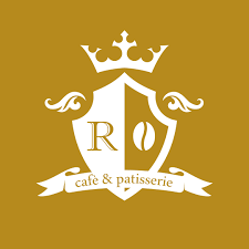 un logo per un caffè e pasticceria con uno scudo e una corona .