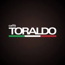il logo del caffè toraldo è su uno sfondo nero .