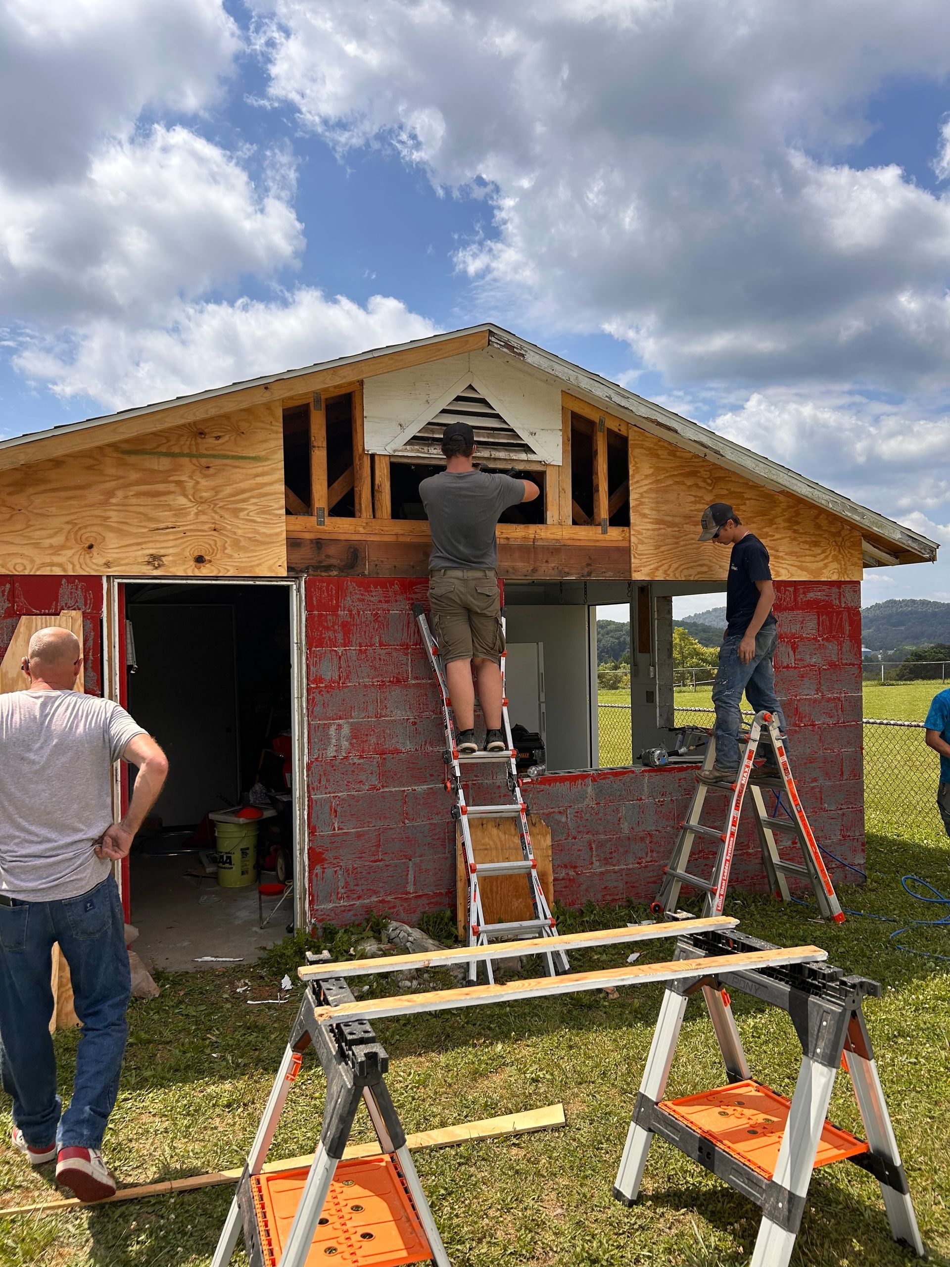Volunteers Huddle Together – Morgantown, WV – O'Connor Contracting