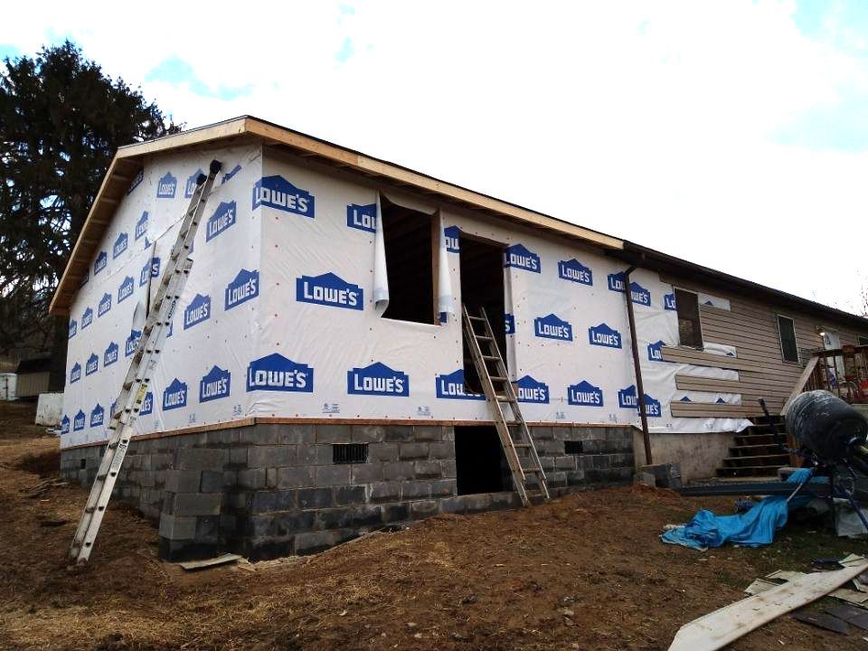 Carpenters On The Roof Of New Building Addition – Morgantown, WV – O'connor Contracting