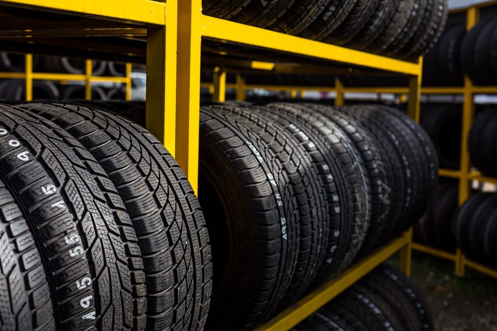 Tires stacked on shelves in a storage room, angled perspective — Plateau Tyres in Ballina, NSW