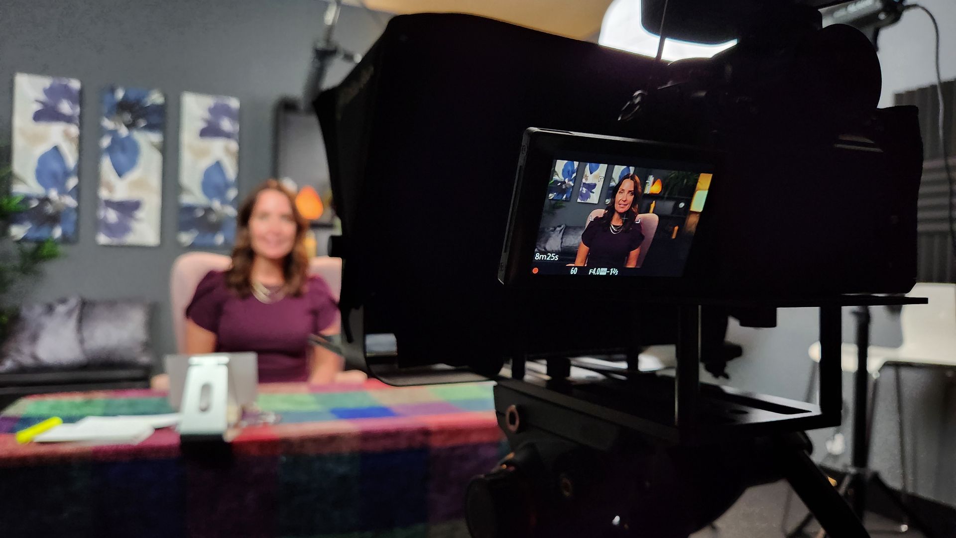 Behind-the-scenes photo of Calvisions filming a commercial for Solace Divorce Mediation’s website in the Addison, Illinois studio.