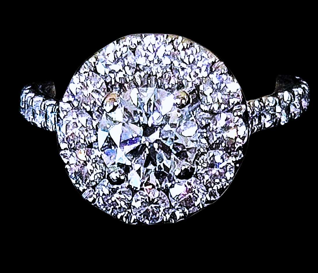 Diamond engagement ring with halo setting, sparkling against a black background.
