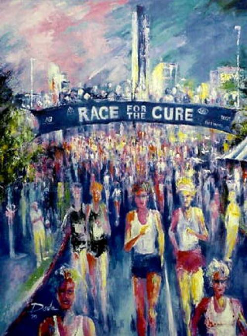 Race for the Cure, runners approaching the finish line, large crowd, banner overhead.