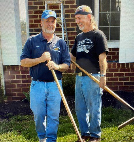 Men with Squeegee — Waynesboro, VA — Josh's Paving Inc.