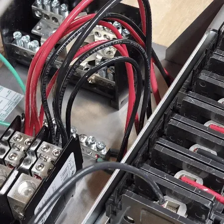 A bunch of wires are connected to a electrical box