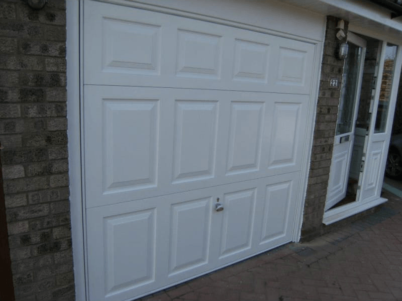 wooden garage shutter in white colour