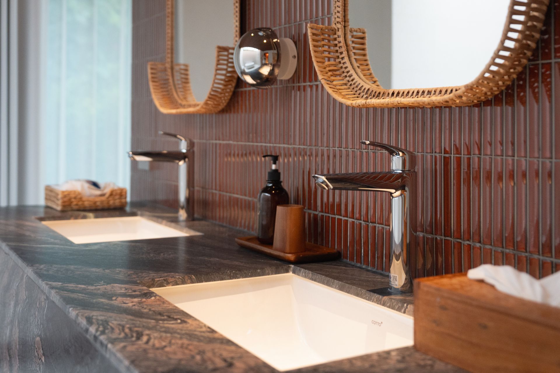 Bathroom renovation in progress. White vanity, tub, and tile. Hammer and tools on floor. Bathroom renovation in progress. White vanity, tub, and tile. Hammer and tools on floor.