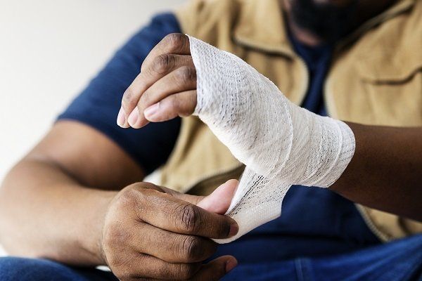 Man's Hand With Bandage — Tulare County, CA — Perez Law Firm