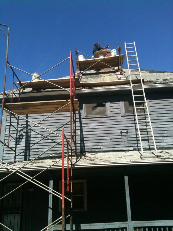 Man on the Roof Repairing the Chimney — North Royalton, OH — Advanced Masonry & Chimney Service