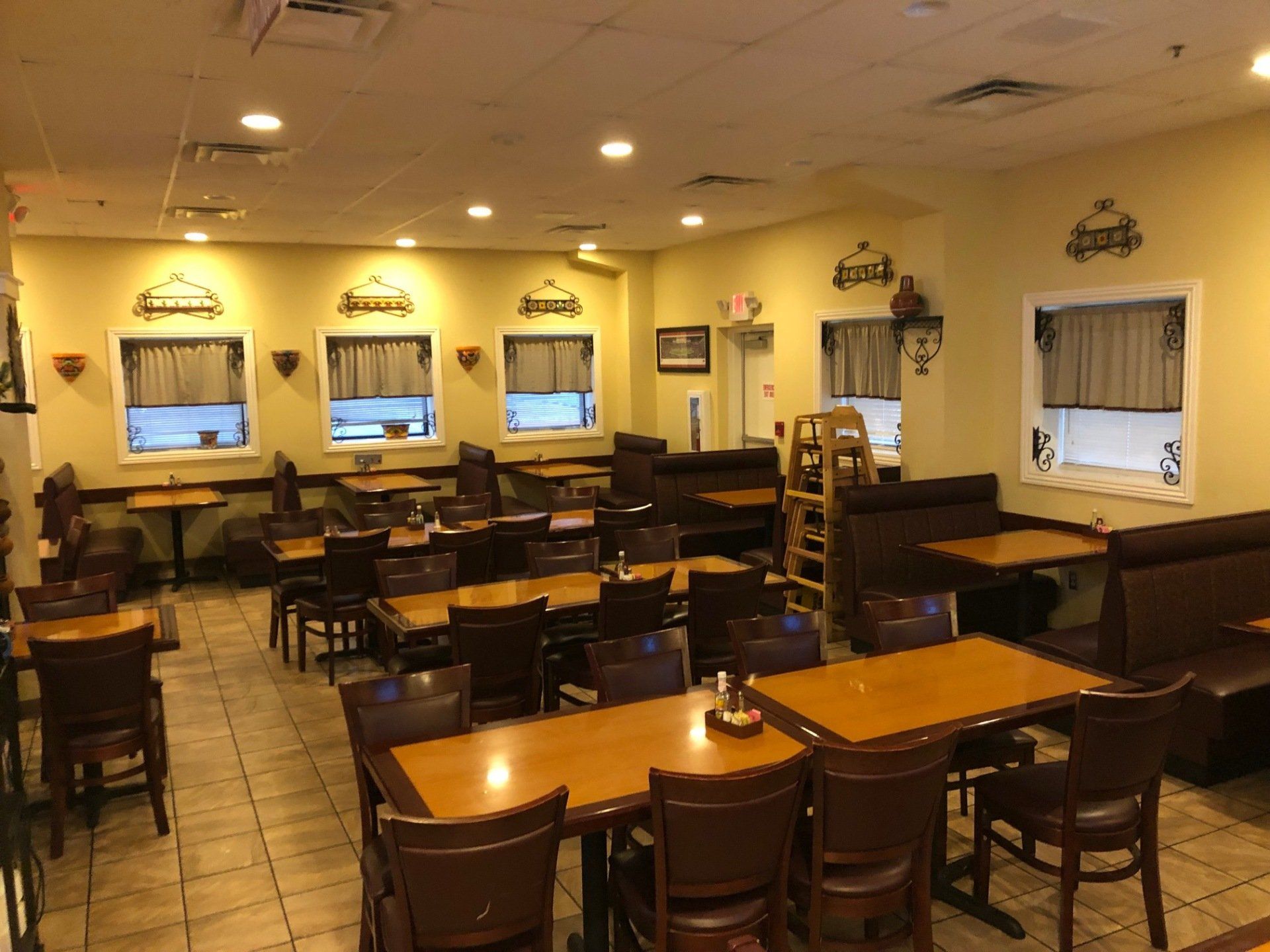 A restaurant with lots of tables and chairs