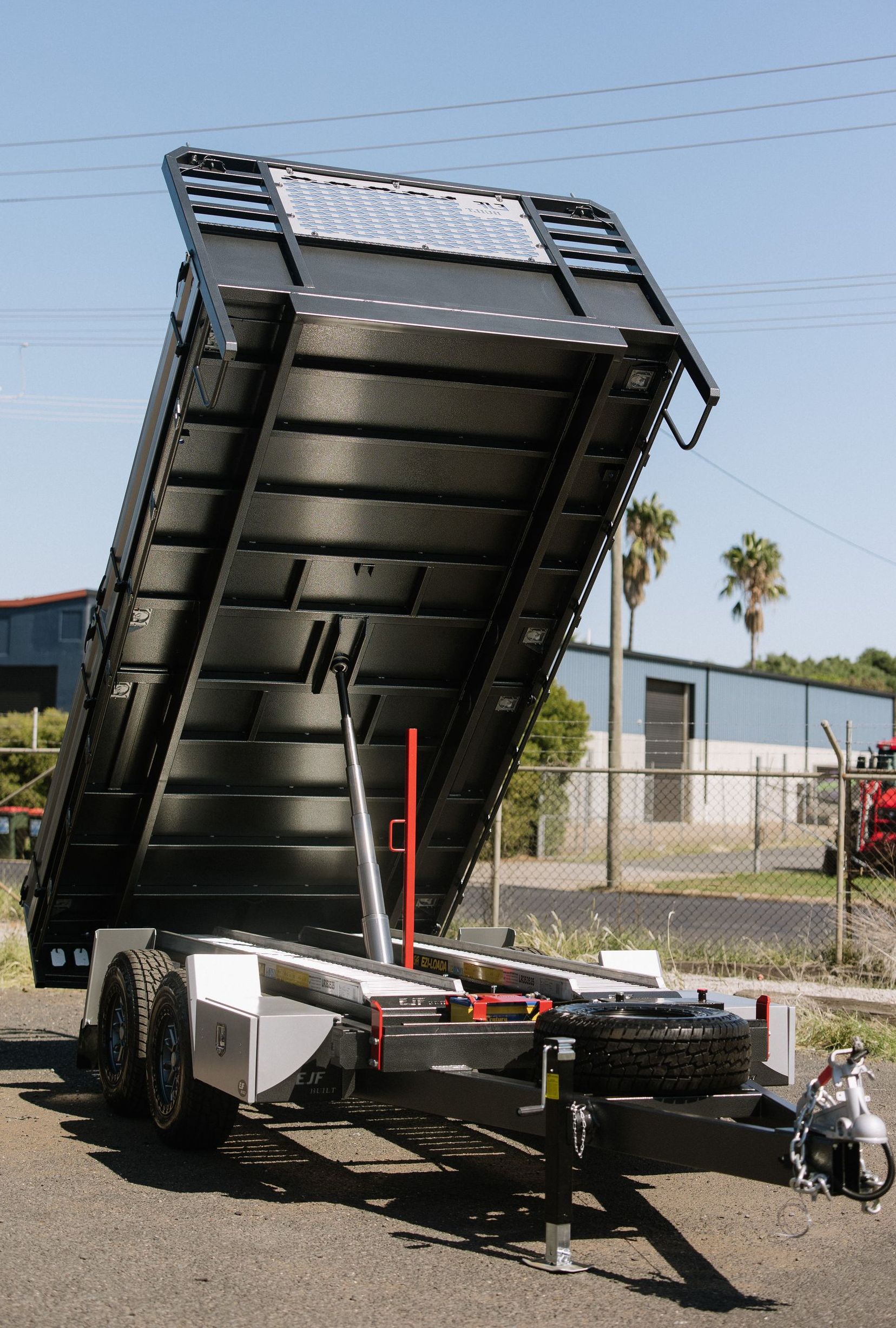 Black Dump Trailer Tilted Up — EJF Built in Dubbo, NSW