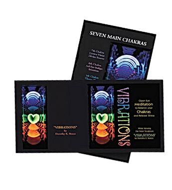 Black box set with art of seven chakras, includes meditation guide.