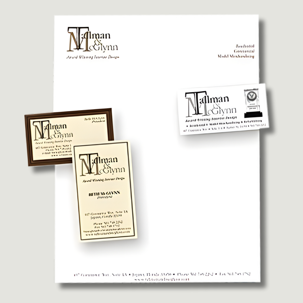 Stationery layout with company logo, business cards, and contact information.
