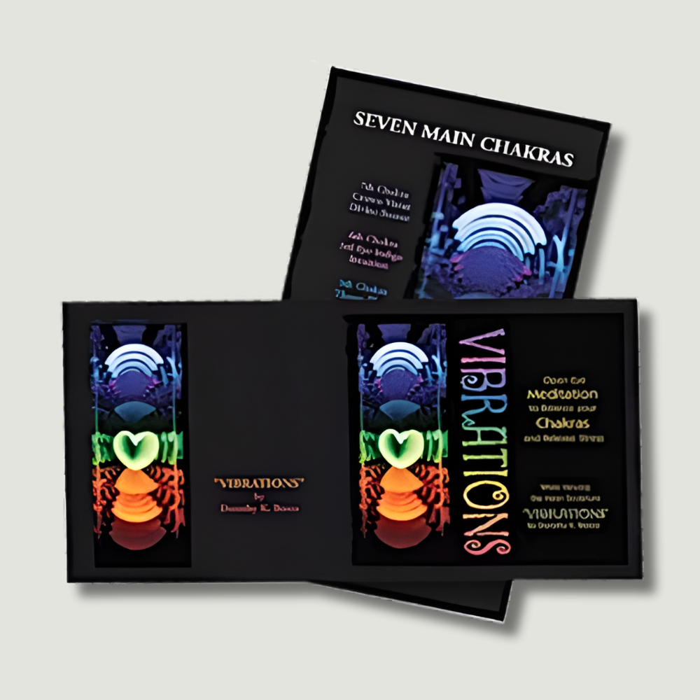 Black box set with art of seven chakras, includes meditation guide.