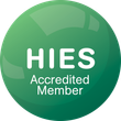 A green and purple badge that says hies accredited member and approved code trading standards uk.