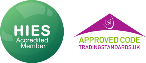 A green and purple badge that says hies accredited member and approved code trading standards uk.