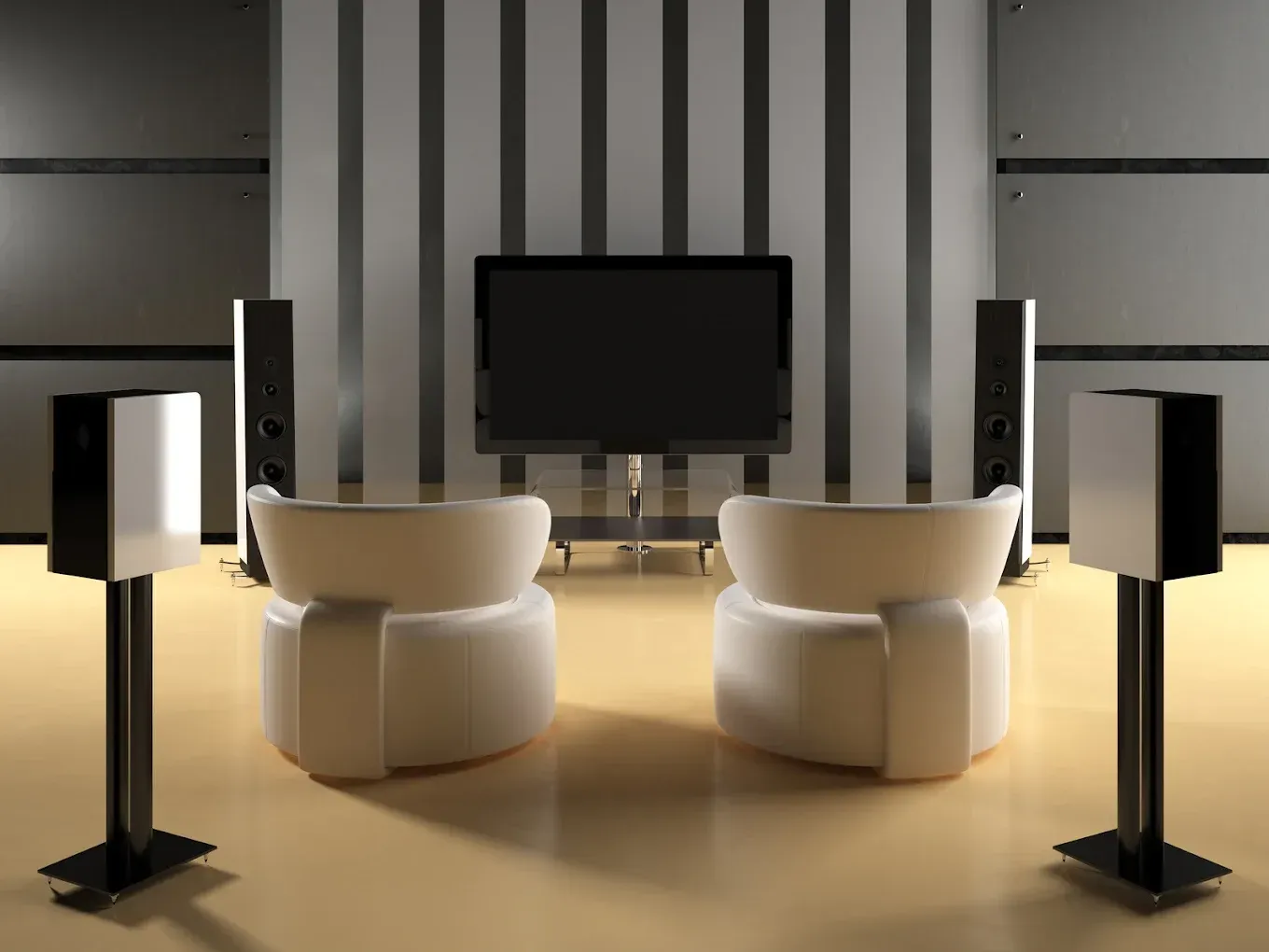 Modern home theater setup with a large TV, white chairs, and speakers.