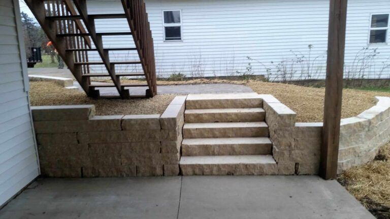 A set of stairs leading up to a white house