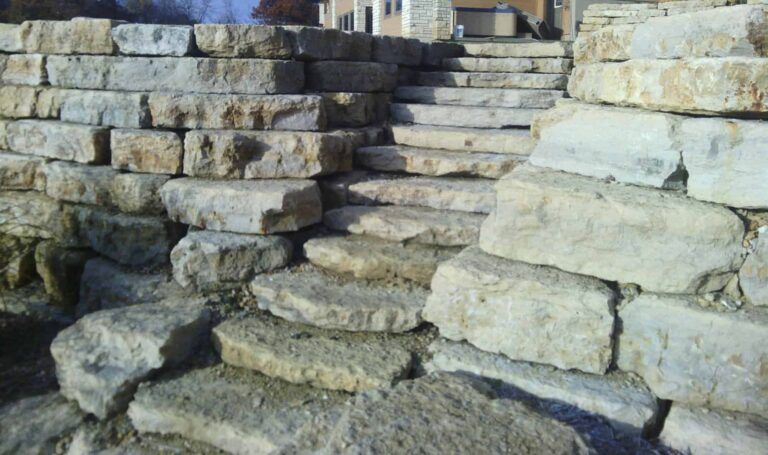 A stone wall with stairs built into it
