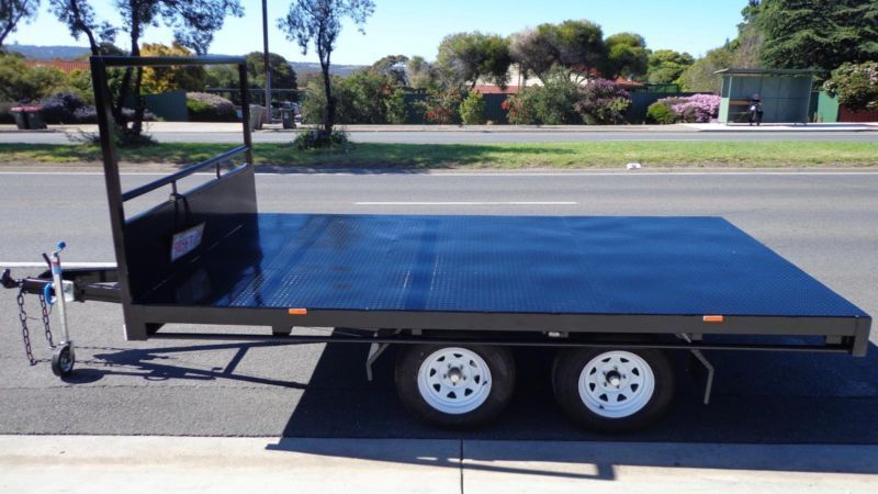 A Black Trailer Is Parked On The Side Of The Road - Voyager Trailers in Yarrawonga, NT