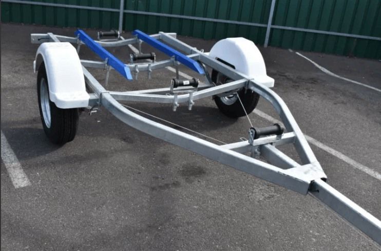 A Boat Trailer is Parked in a Parking Lot— Voyager Trailers in Yarrawonga, NT