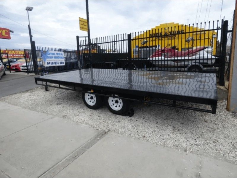 A Custom Trailer is Parked on the Side of the Road — Voyager Trailers in Yarrawonga, NT