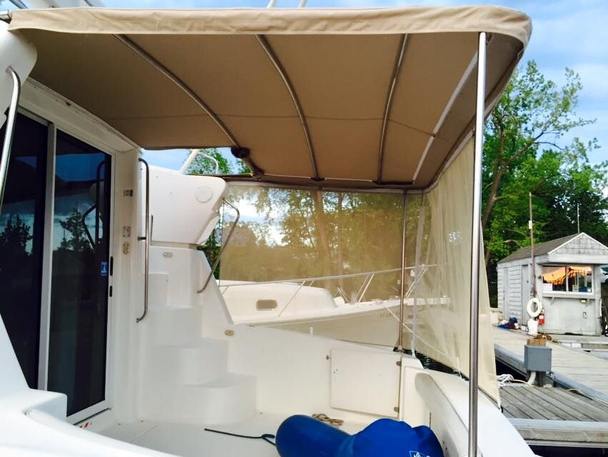 A boat with a canopy on top of it