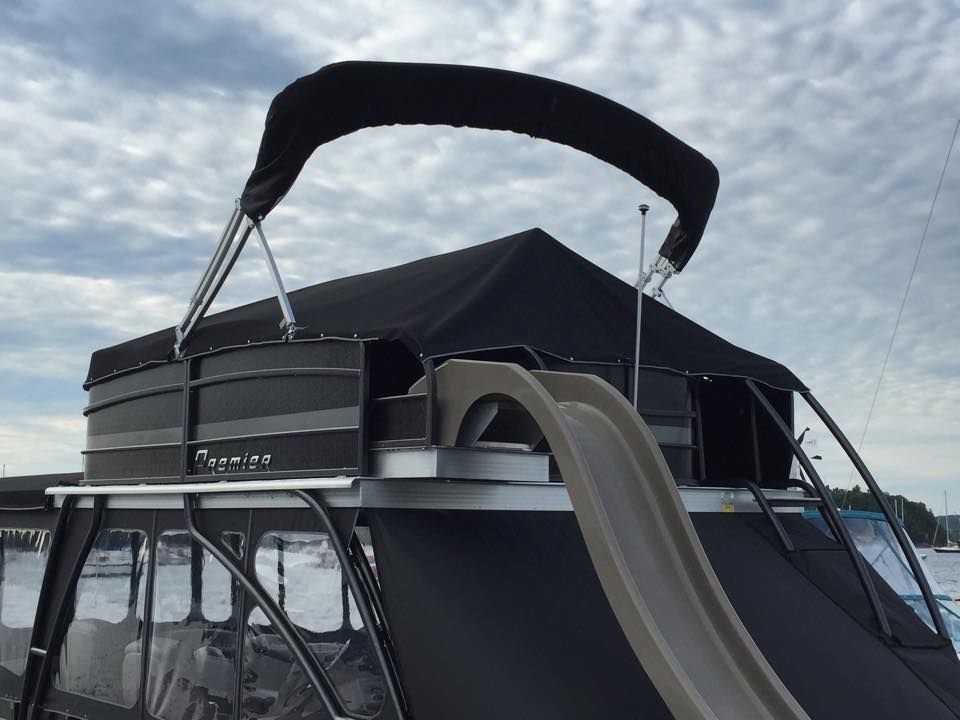 A boat with a slide on top of it