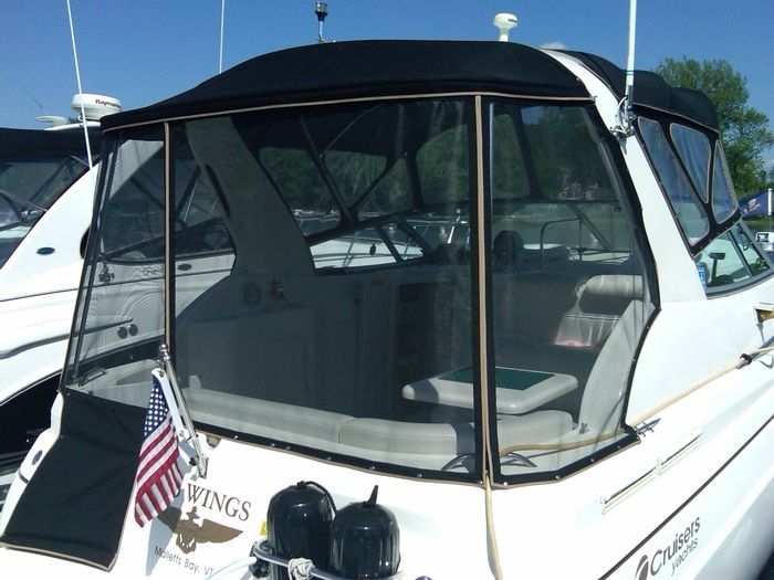 A boat with the word wings on the side