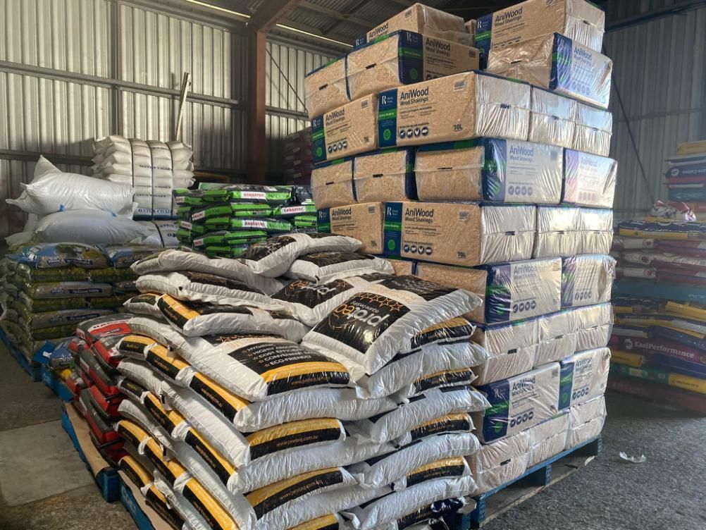 A Warehouse Filled With Lots Of Bags And Boxes — SF Produce In Sarina, QLD