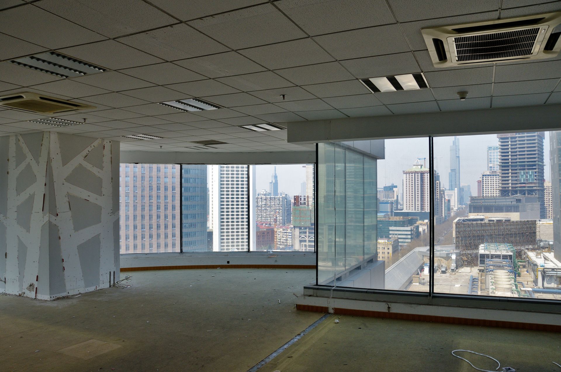 An empty office with a view of the city