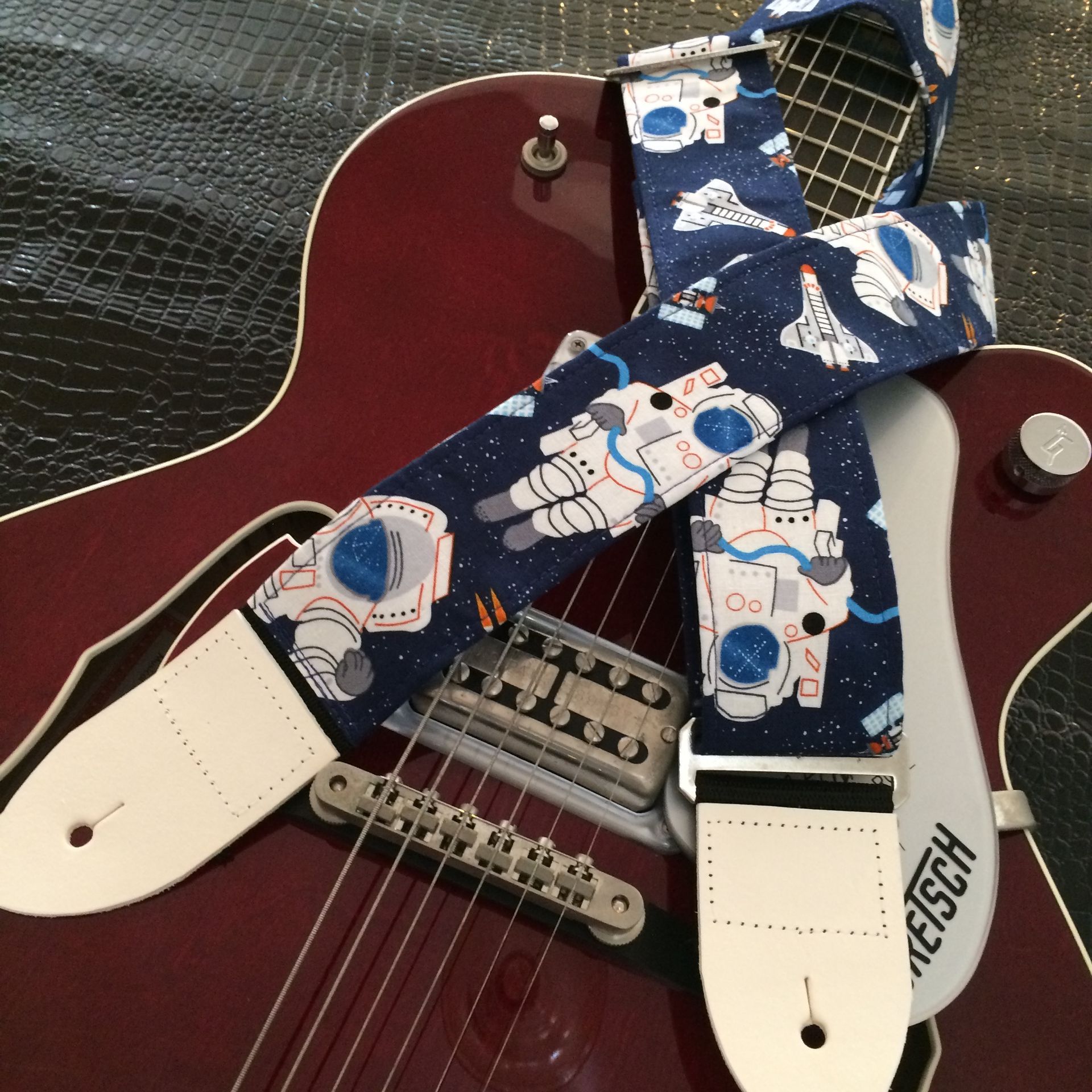 Cosmic explorer astronaute guitar strap