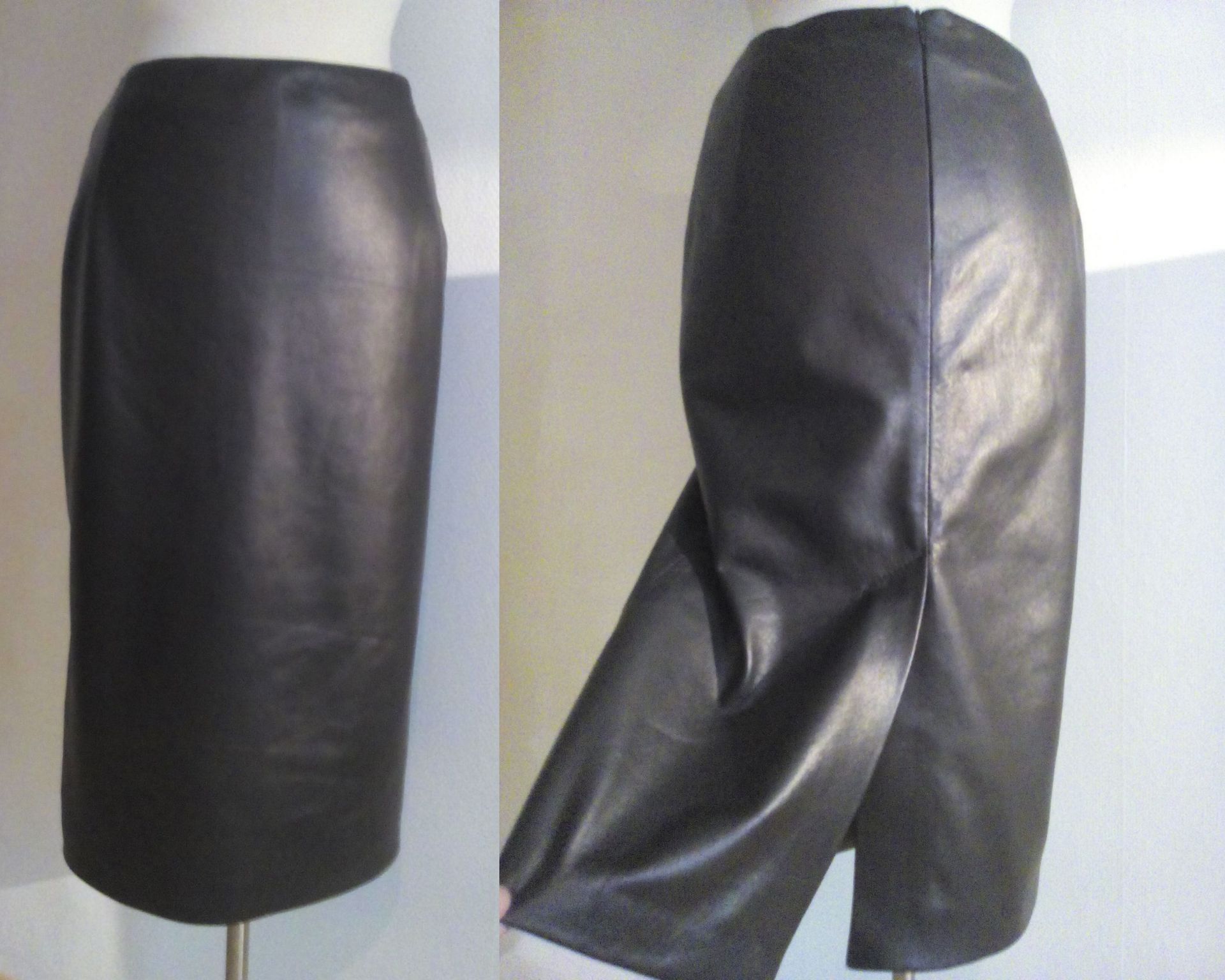 Zwarte lange leren rok achter een split