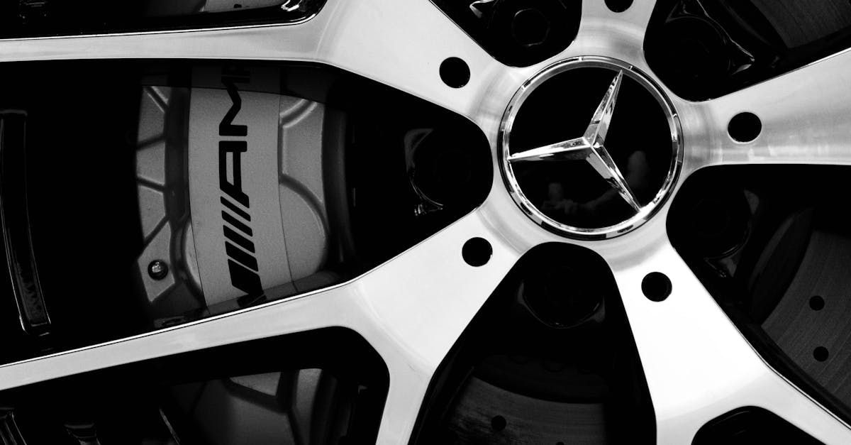 A black and white photo of a mercedes wheel  | S&S Bavarian Auto