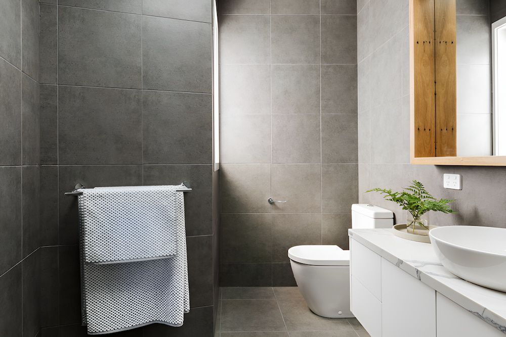 A Bathroom With A Marble Wall — Stone Theory In Queanbeyan West, NSW