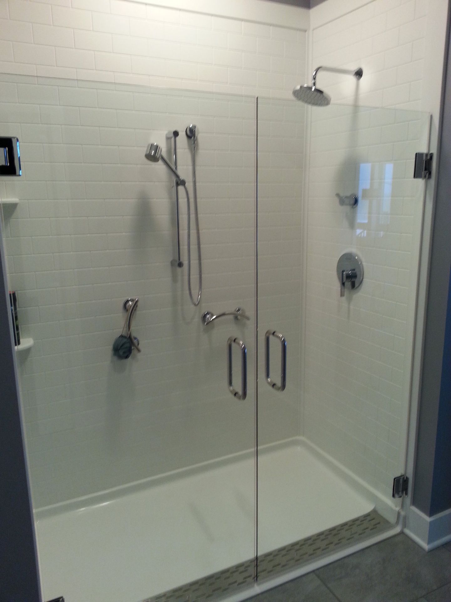 Glass shower door — Garage Organizers in Erie, PA