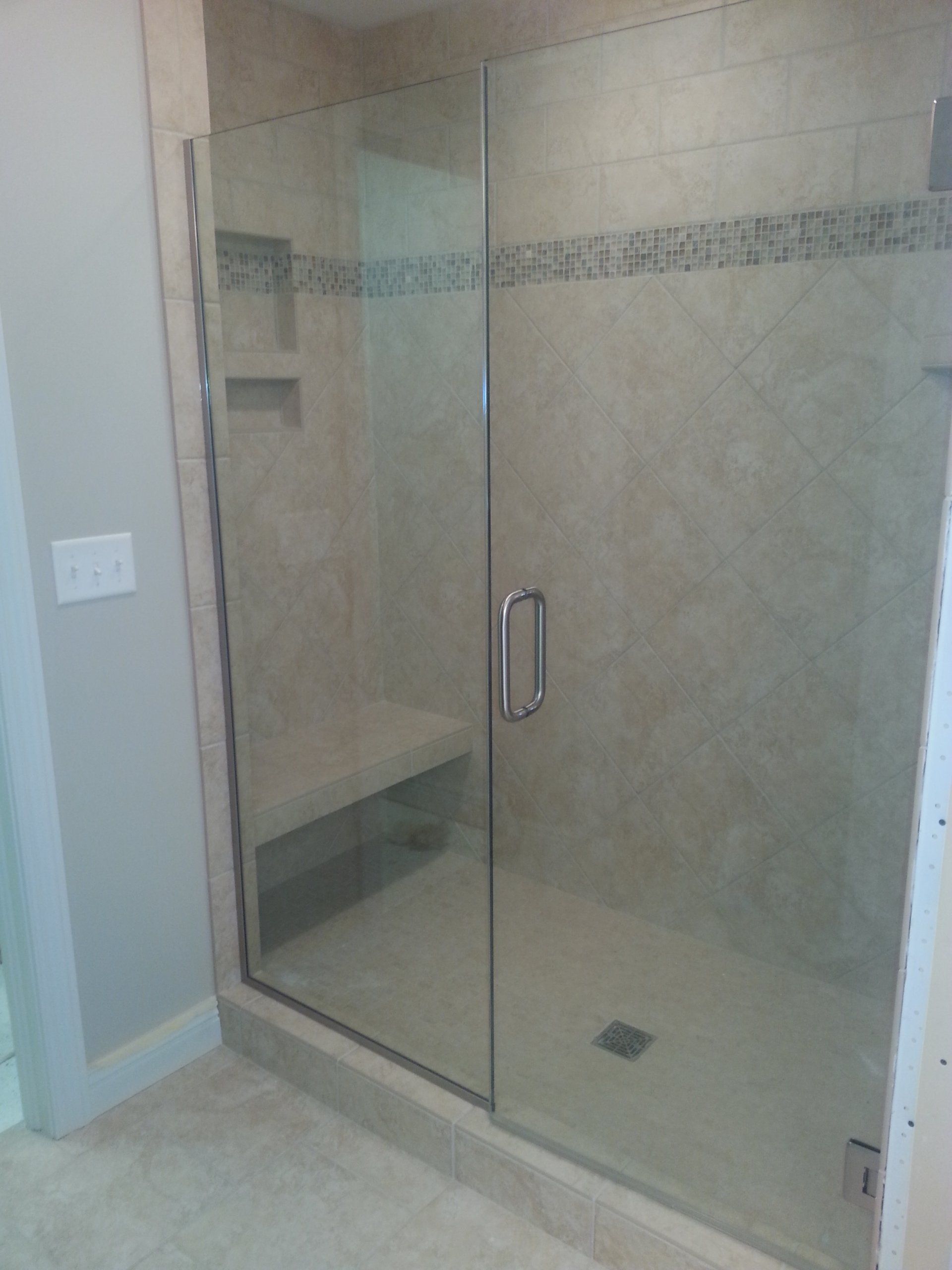 Bathroom with glass door — Closet Design & Remodeling in Erie, PA