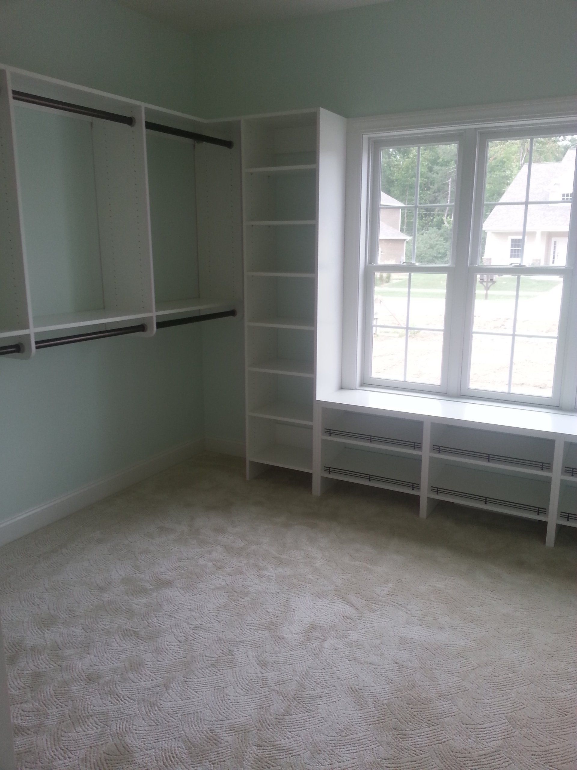 Cabinets and window — Closets & Closet Accessories in Erie, PA