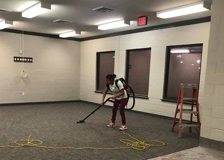 Cleaning Service Company — Worker Cleaning the Office in Prairieville, LA