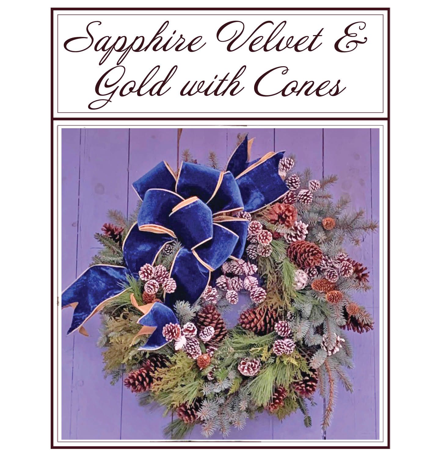 Blue velvet and gold cone floral wreath on a lavender background, titled “Sapphire Velvet & Gold with Cones”