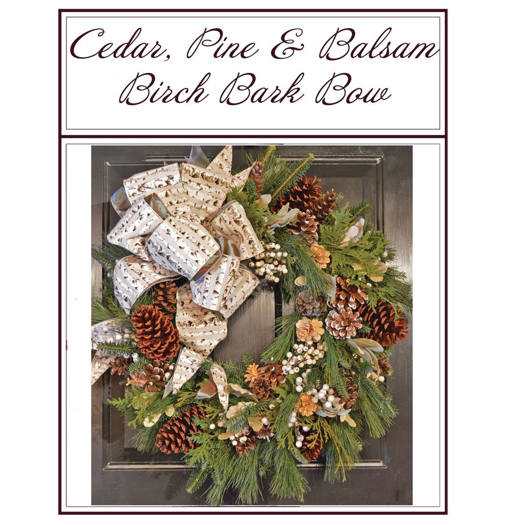Cedar, pine and balsam birch bark bow wreath with pinecones and ribbon on a door-style background
