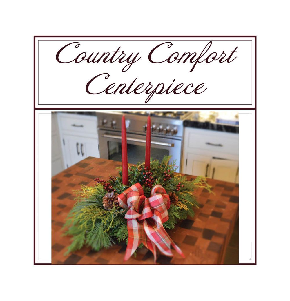 Country Comfort Centerpiece craft cover with red candles and ribbon on a kitchen table