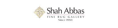 The shah abbas fine rug gallery logo is on a white background.