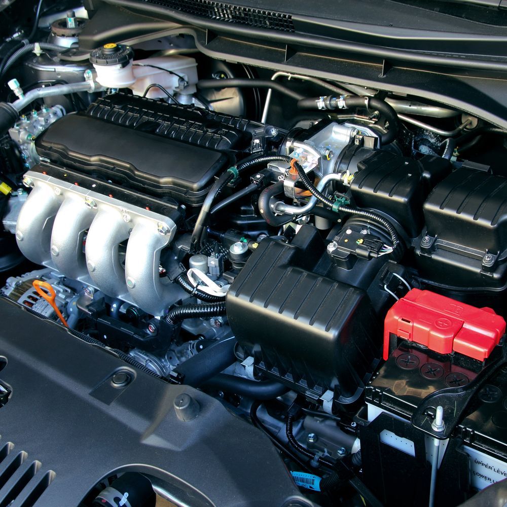 Car Engine, Black and Silver Components, Red Battery, Under the Hood — Advanced Auto Electrics & Mechanical in Innisfail, QLD